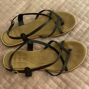 Black strappy sandals with gold edge